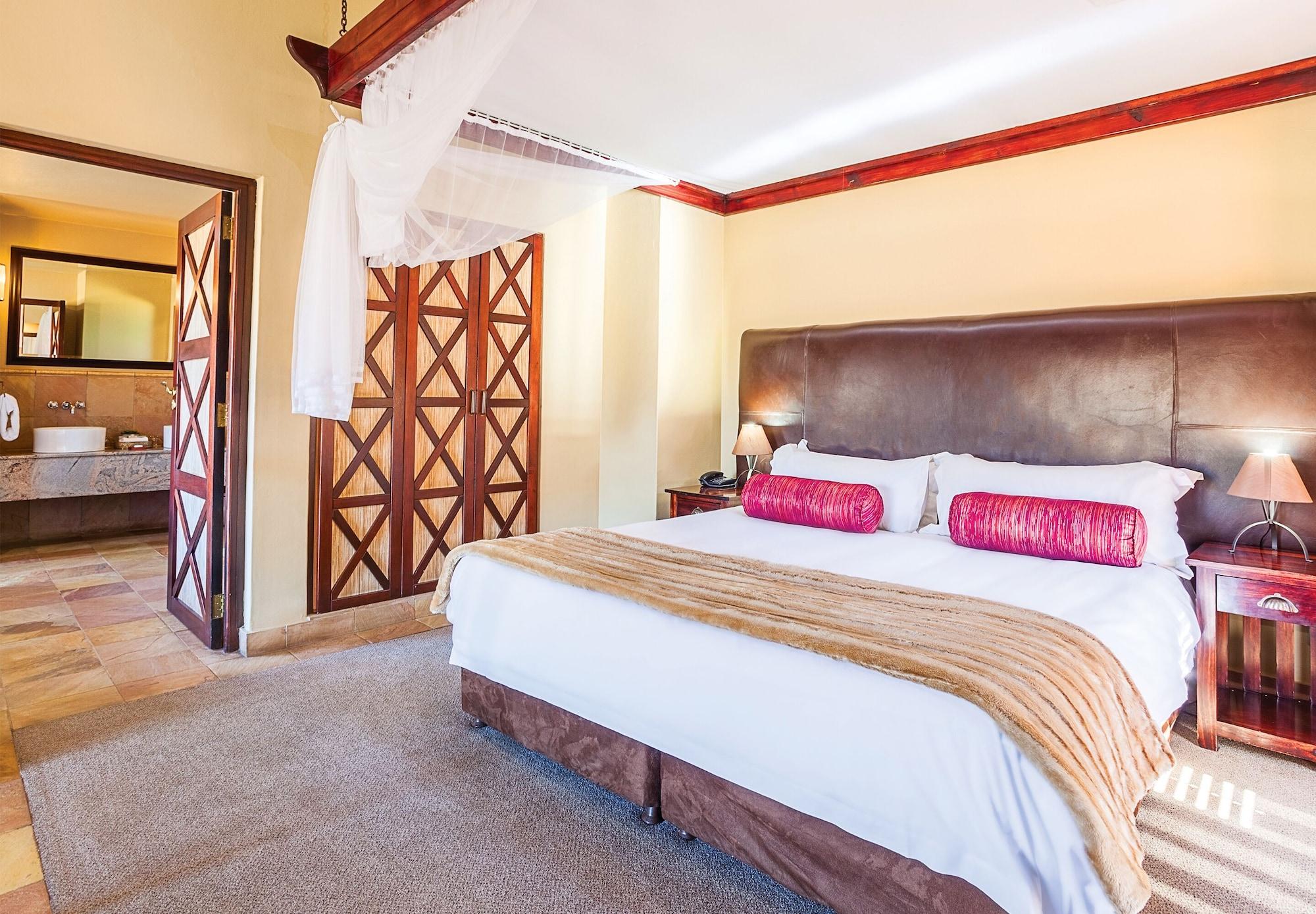 Kloofzicht Lodge & Spa Krugersdorp Exterior foto A bedroom at the Kingdom Hotel