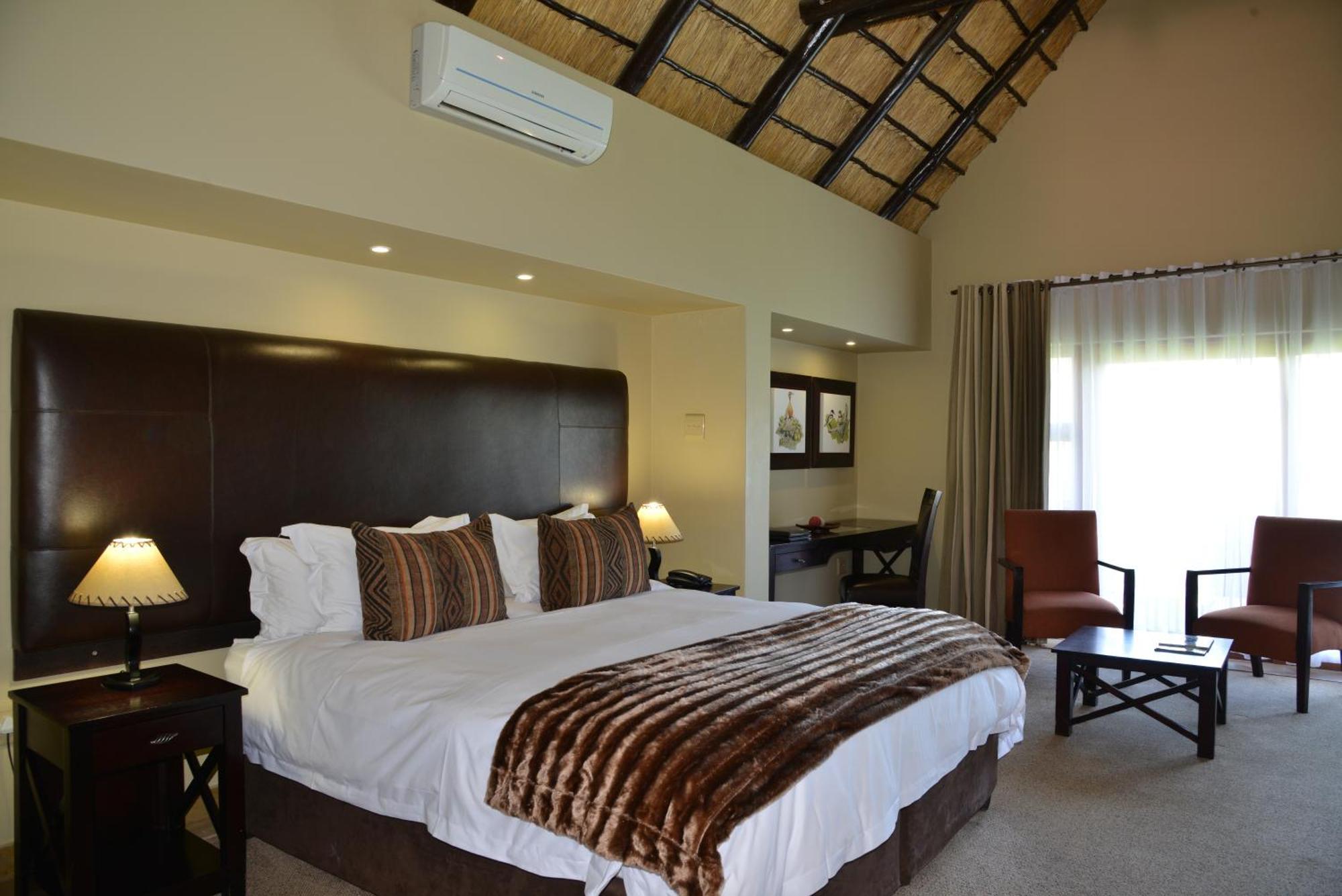 Kloofzicht Lodge & Spa Krugersdorp Quarto foto A bedroom at the Tintswalo Safari Estate